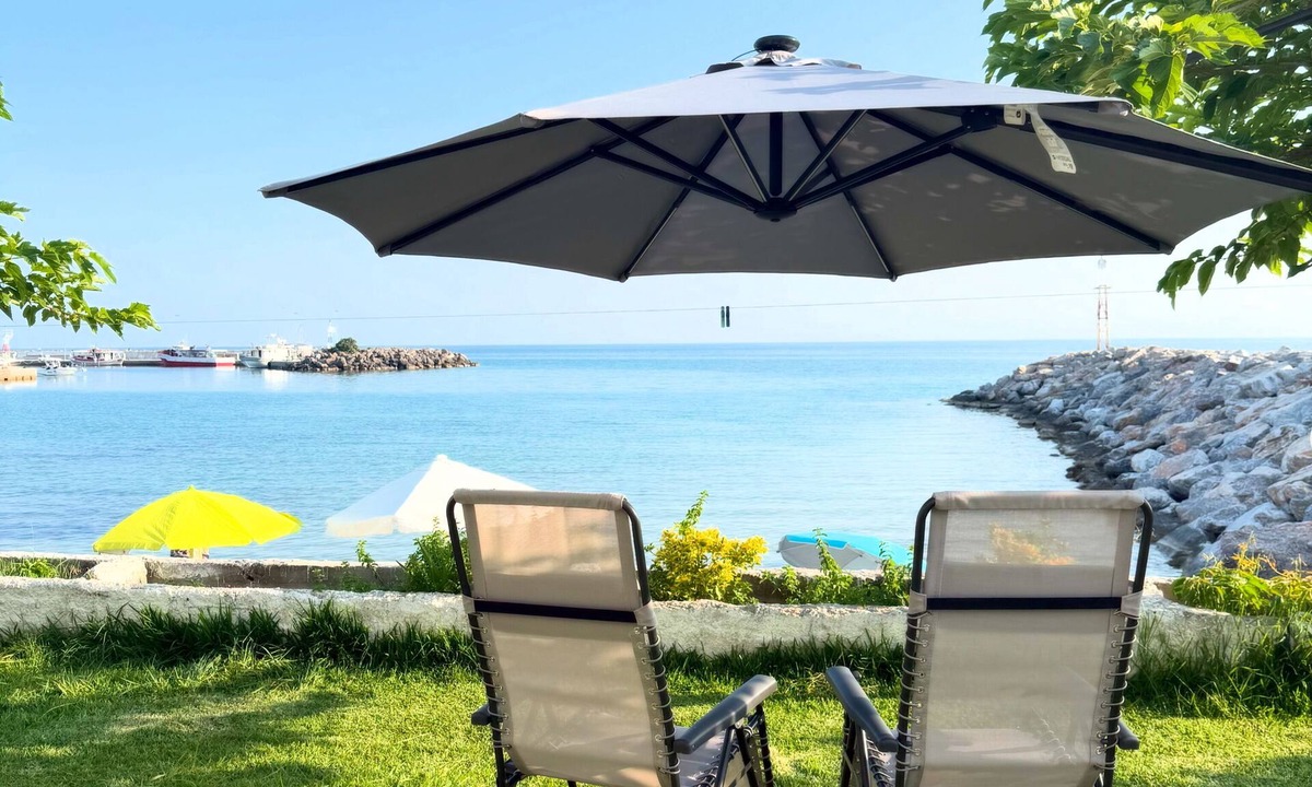 Nea Skioni Apartment | Beach Front Heaven Wake up to the sound of waves and step straight into the sea