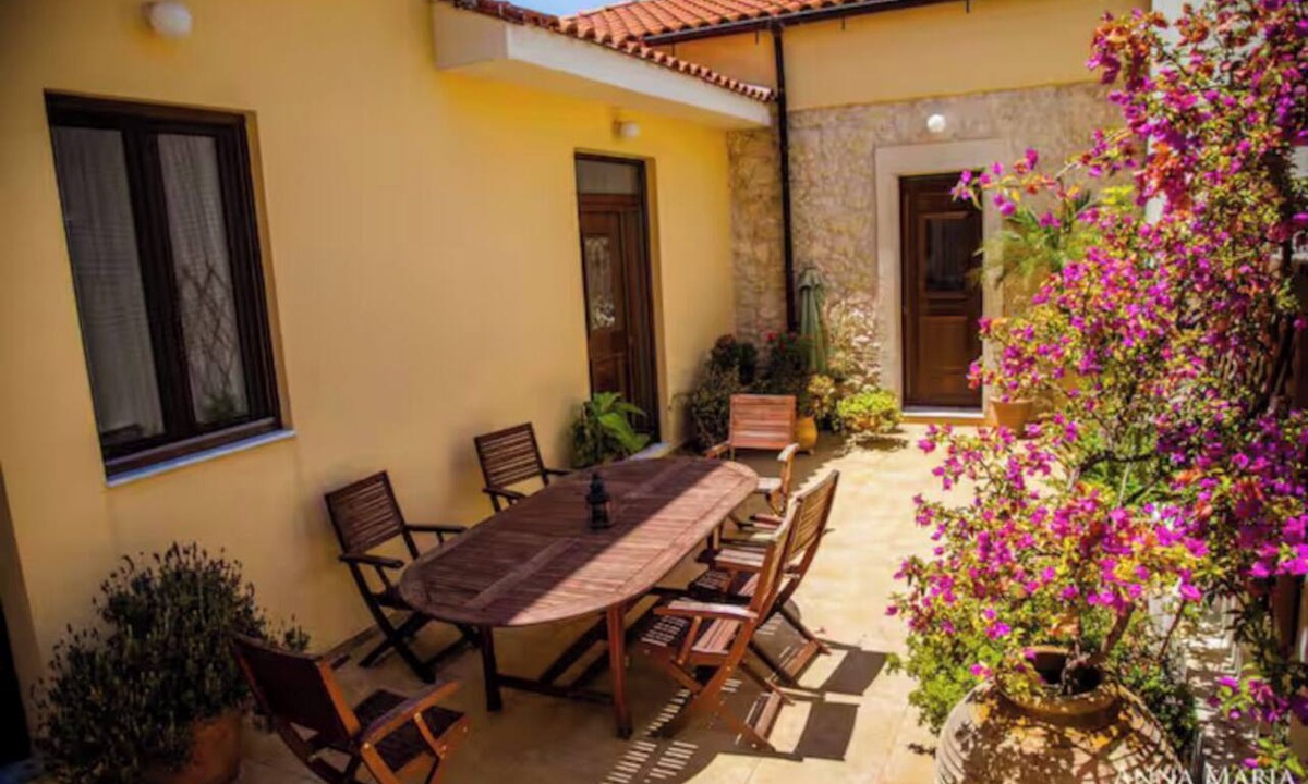 Archanes House | luxurious traditional stone villa built to make the Cretan summers milder