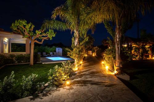 Petaloudes House | Sea Breeze & Nature villa, with heated pool and garden retreat