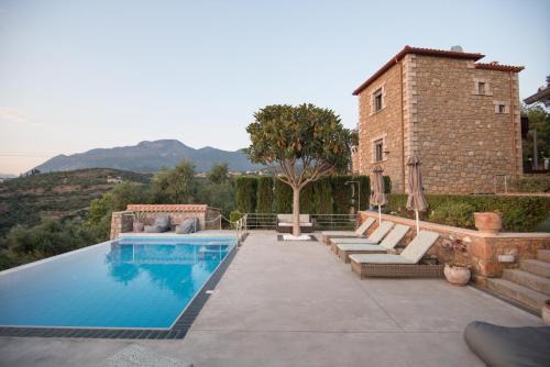 Pigadia Apartment | Villavia Residence - Sorocco & Ostria Retreats with Pool access