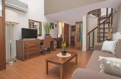 Tzavros House | Apartment 'Corfu Club Maisonette 4' with Shared Pool, Wi-Fi and Air Conditioning
