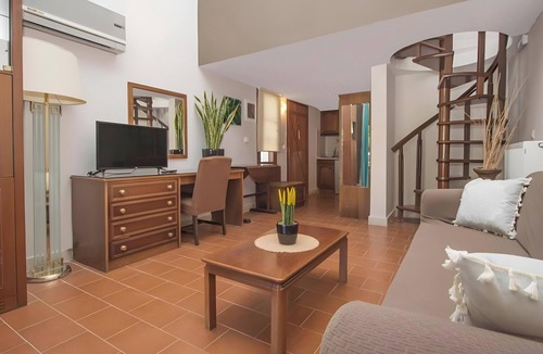 Tzavros House | Apartment 'Corfu Club Maisonette 3' with Shared Pool, Wi-Fi and Air Conditioning