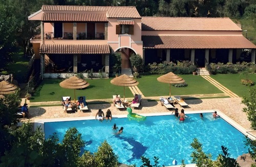 Tzavros House | Apartment 'Corfu Club Maisonette 1' with Shared Pool, Wi-Fi and Air Conditioning