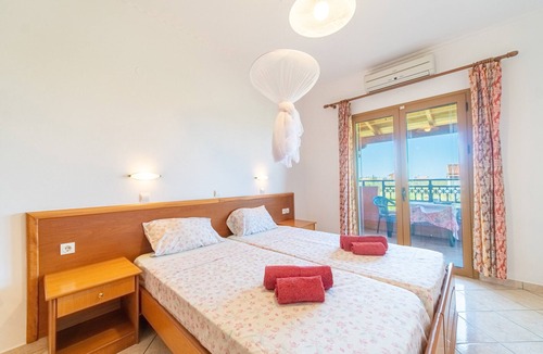 Arillas Apartment | Apartment 'Giannis 9' with Shared Garden, Wi-Fi and Air Conditioning