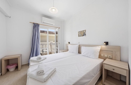 Kavos Bed & Breakfast | Bed and Breakfast 'The Kavos Sandy Inn-Double Room' with Shared Pool, Wi-Fi and Air Conditioning