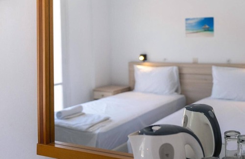 Kavos Bed & Breakfast | Bed and Breakfast 'The Kavos Sandy Inn-Double Room' with Shared Pool, Wi-Fi and Air Conditioning