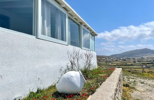Xilokeratidi House | Black Pebble Myconian House