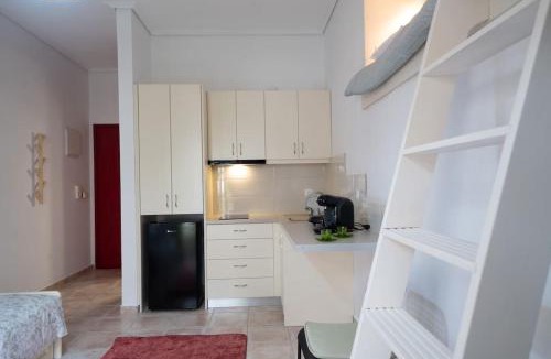 Delfoi Apartment | Delphian Colors - Red Edition by Filos Inc