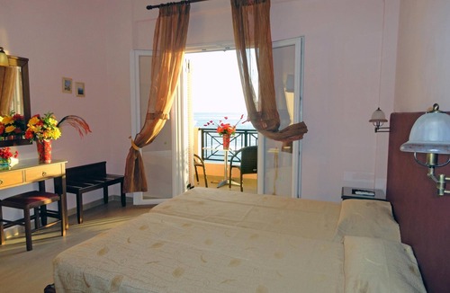 Benitses Apartment | Galini Sea Apartment 5 at the Beach with Wi-Fi, A/C & Garden