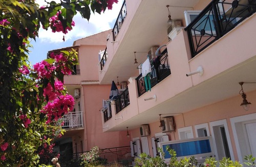Benitses Apartment | Galini Sea Apartment 5 at the Beach with Wi-Fi, A/C & Garden