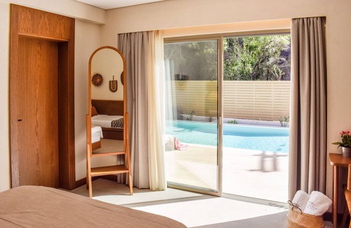 Koukounaries Hotel | Mandraki Village Boutique Hotel