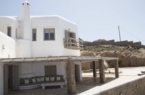 Fanari Villa | Mykonos Villa Coralba with swimming pool, helipad, sunset and sea view