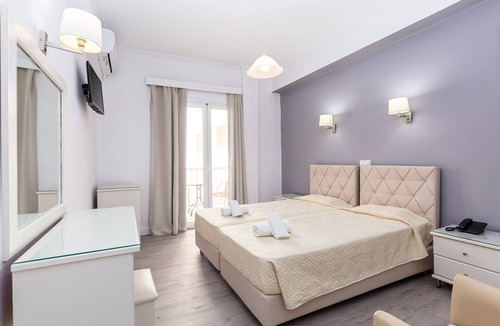 Perama Hotel | Oasis Hotel