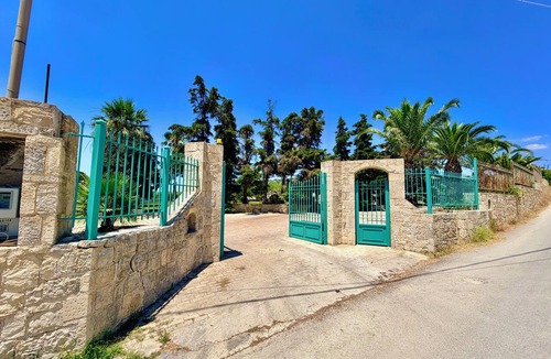 Svoronata House | Palm Villa Ammes | Luxury Estate Pool Tennis Court Steps from Ammes Beach