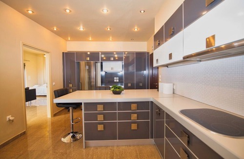 Kontos Apartment | Sea-view apartment in private villa with pool, gardens and modern comfort