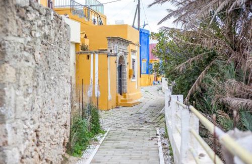 Kallithea House | The red door in Koskinou