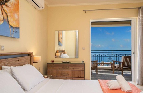 Vlachata House | Villa Andriana offers breath taking views of the Ionian Sea and the island of Zakynthos in the dista