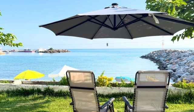 Beach Front Heaven Wake up to the sound of waves and step straight into the sea