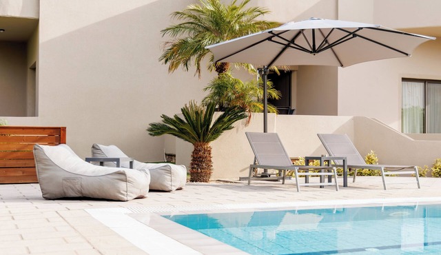 Exquisite Villa with private pool, garden, and free parking.