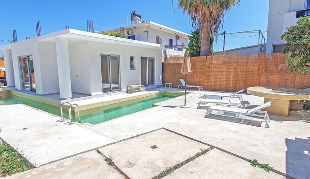 Mpoulakis Apt 64 with swimming pool around it, in the most convenient location