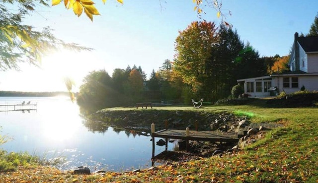 Spacious lakefront home with 5 bedrooms & hot tub! in Farmington