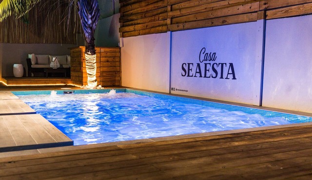 Steps away from the beach, this fully stocked house is perfect for your group! in Santurce
