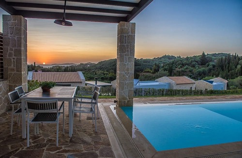 Kavvadades Villa | Alluring Corfu Villa | Villa Corallia | 2 Bedrooms | Spacious Furnished Terrace with Shaded Outdoor Dining Area | Private Garden, Pool and Hot Tub | Prime Location | Arillas, Mega Lithari