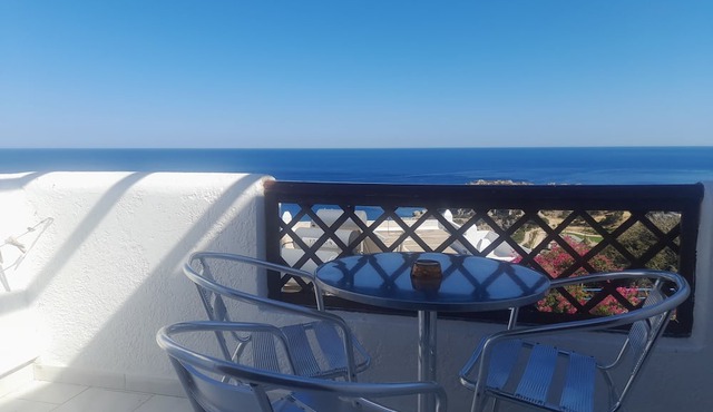 Superior Top Floor Sea View Room with Private Balcony and Shared Pool